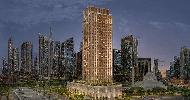 ELIRE tower exterior in Business Bay Dubai at dusk with modern façade